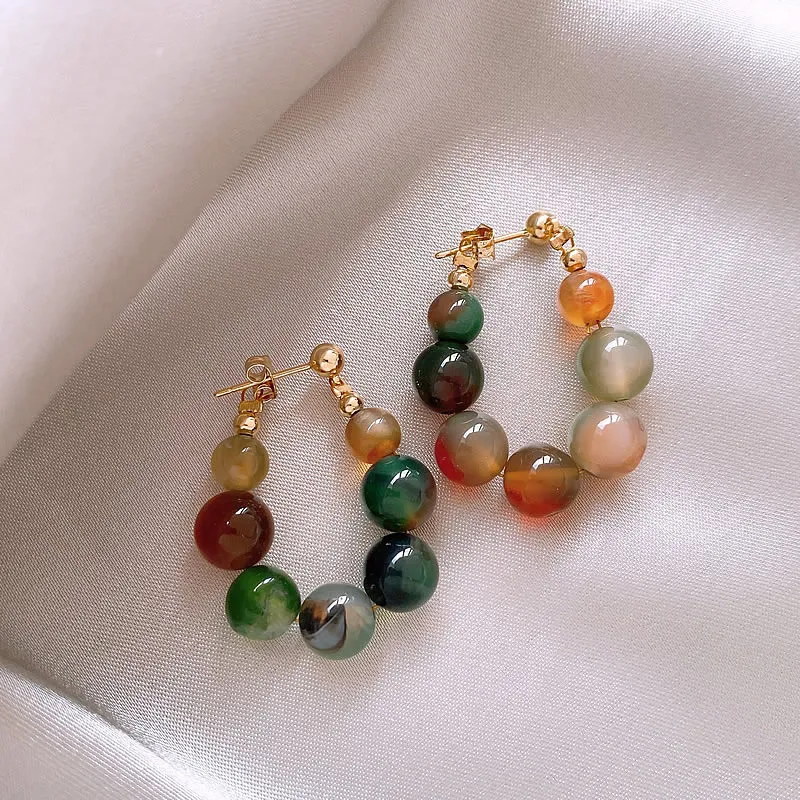 Fascinating earrings with sparkling, multicolored gemstones