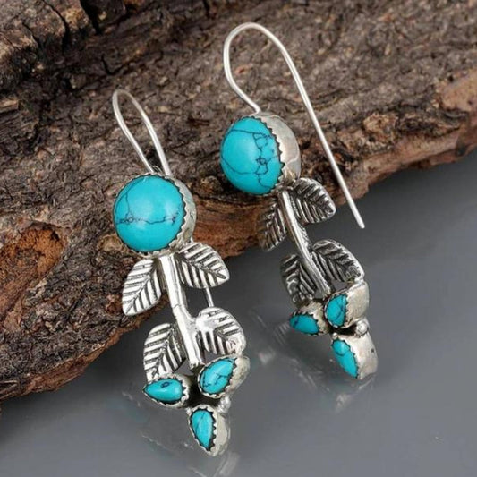 Elegante Opalohrringe mit silbernen Boho-Blättern