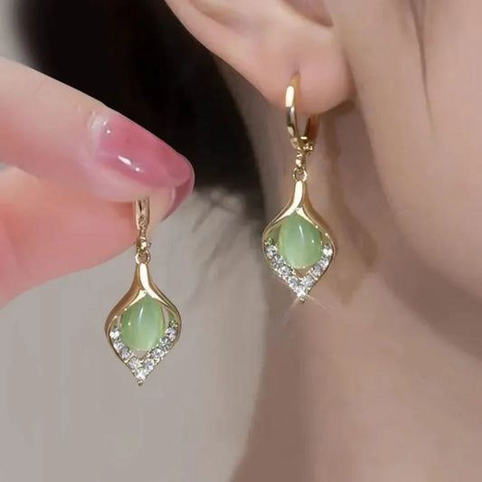 Funky Elegance: Green Crystal Earrings for a Glamorous Appearance