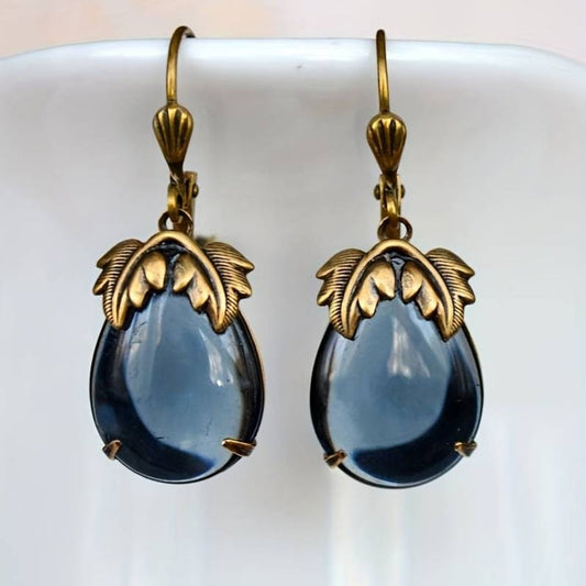 Elegante Vintage Goldohrringe mit blauen Kristalltropfen